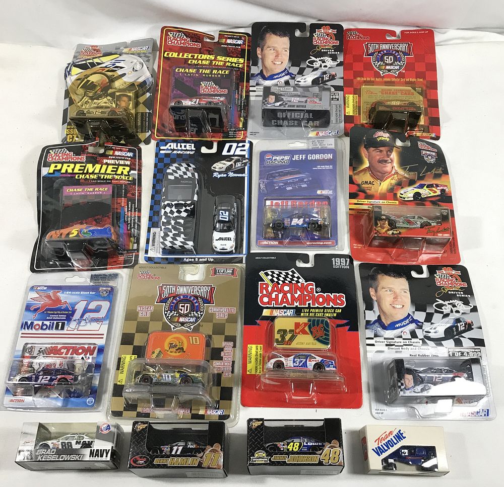 Lot 1307: 16 toy race cars all in sealed packages