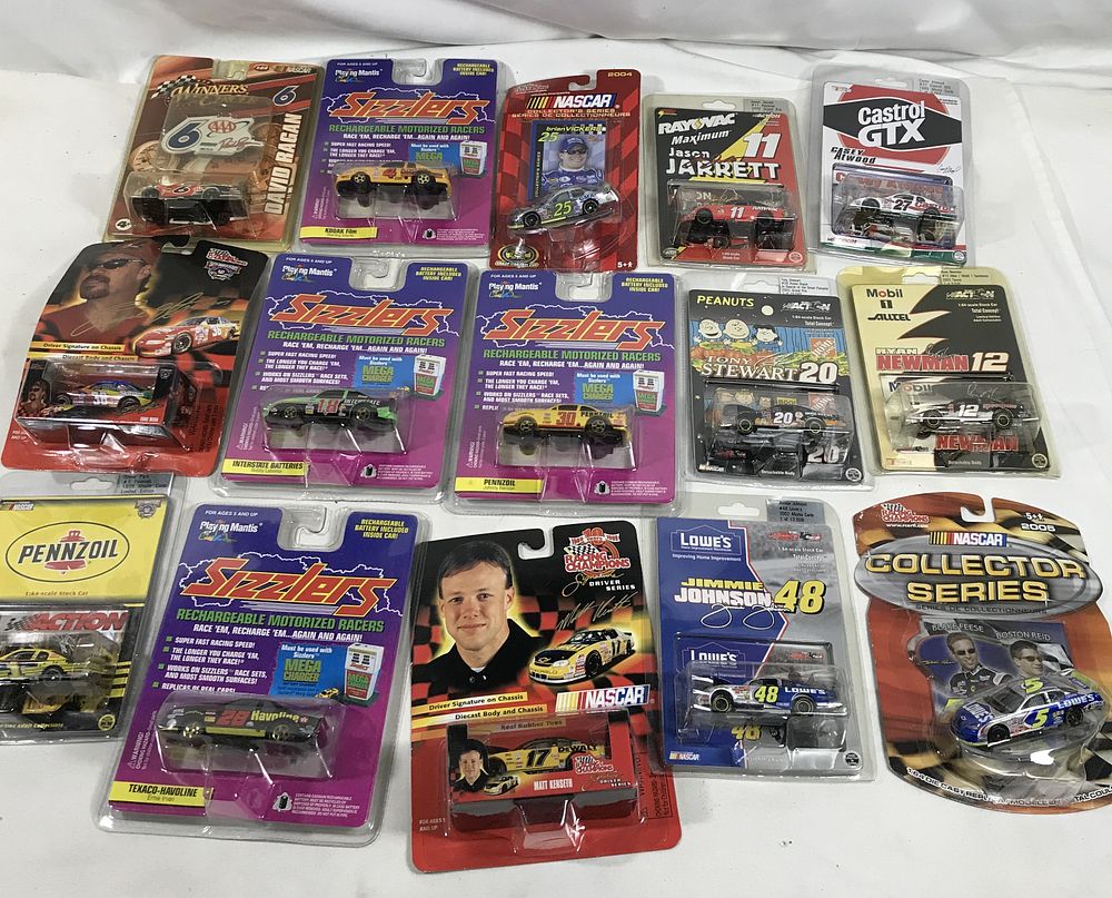 Lot 1308: Race cars, Die-cast 1:64 all in original packaging