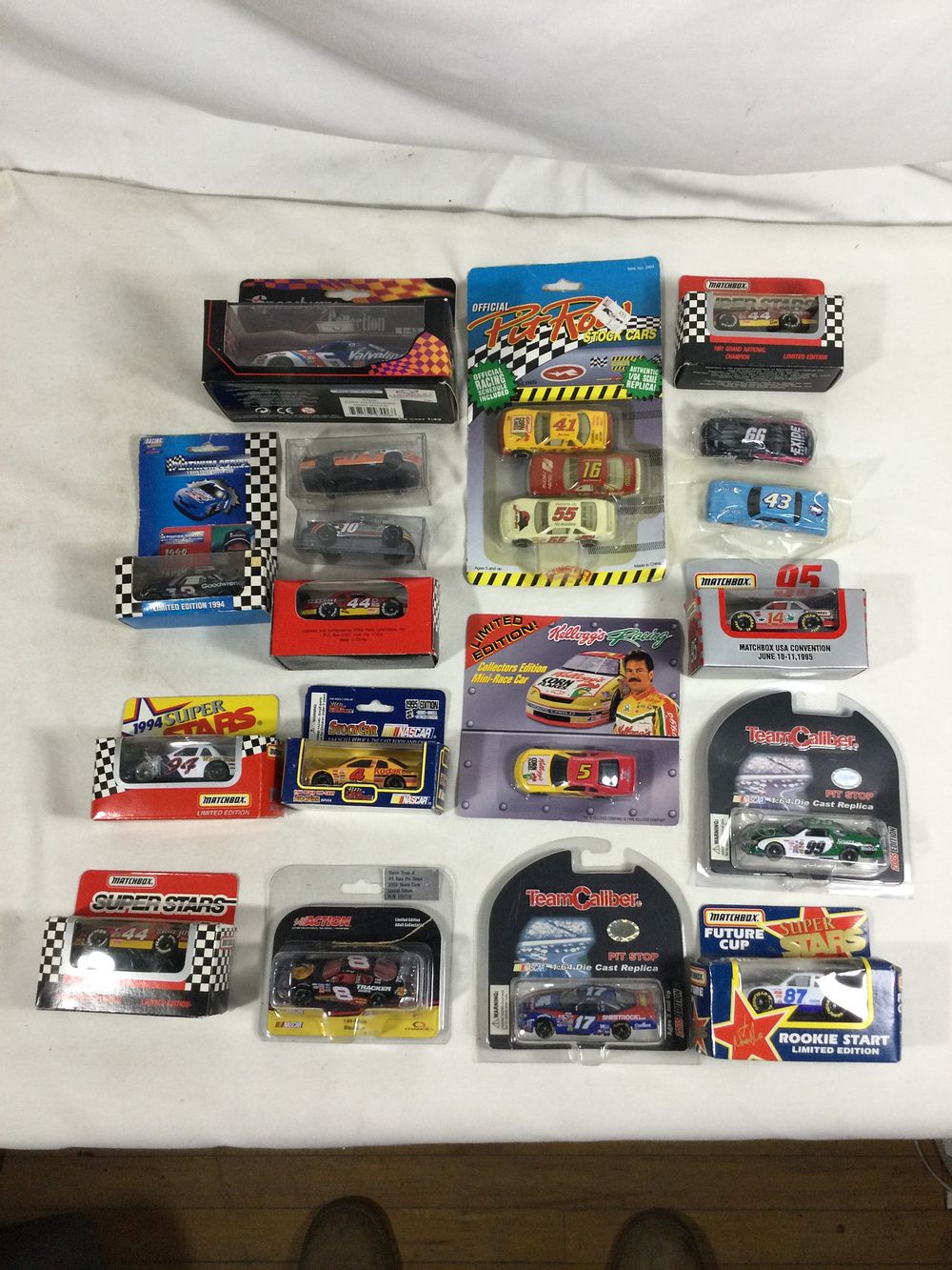 Lot 1323: 20 Die-cast race cars all in sealed packages