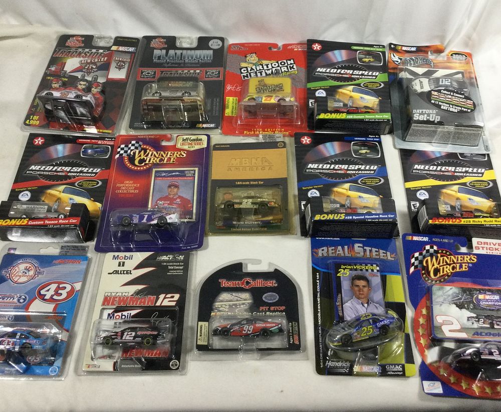 Lot 1334: Diecast Race Car Collection - some in cases