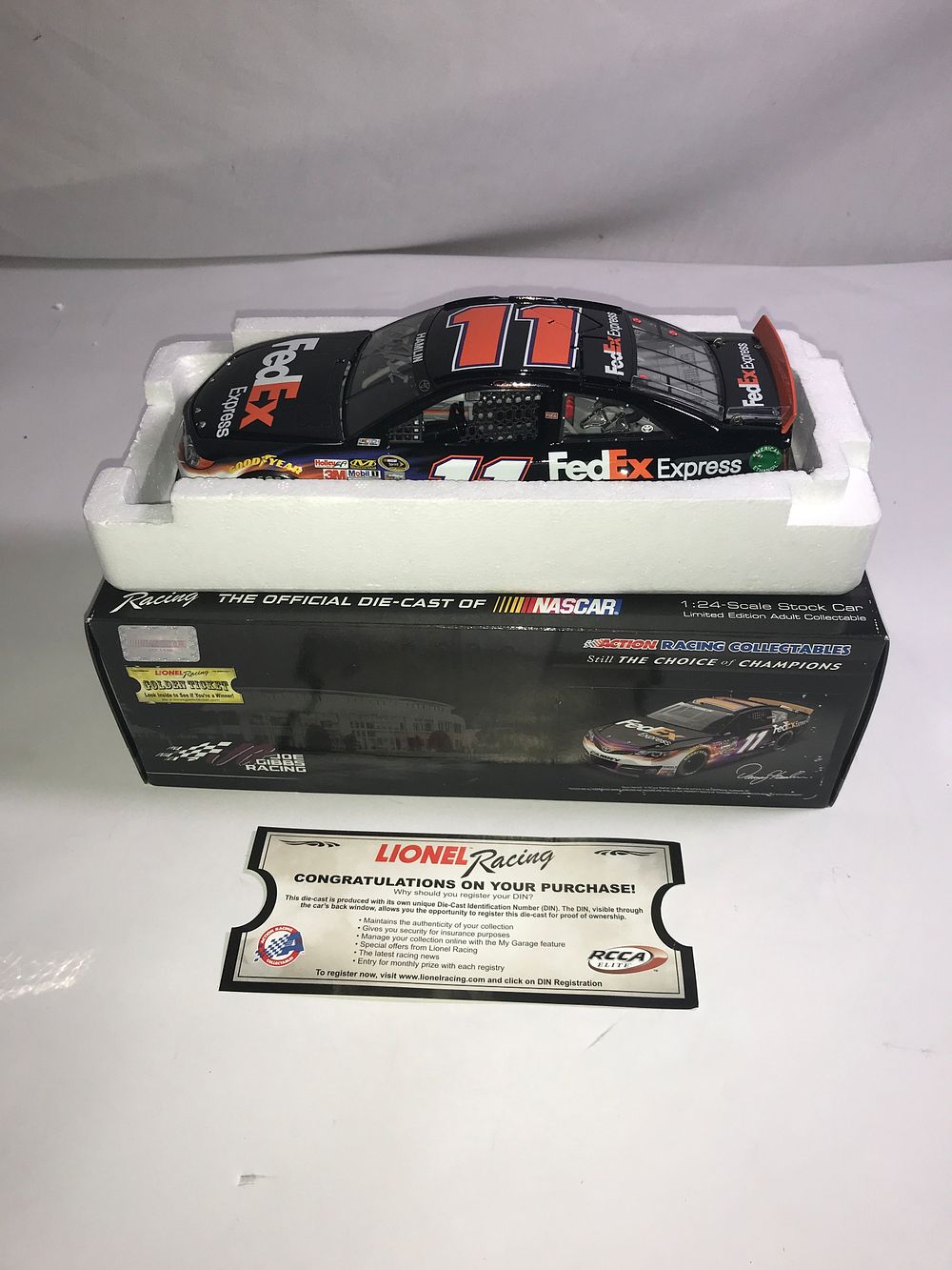 Lot 351: Autographed Denny Hamlin #11 2014 Camry LE