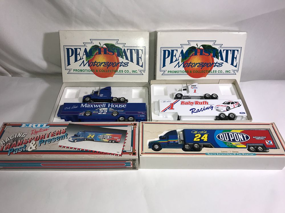 Lot 699: NASCAR Transporter collection of three