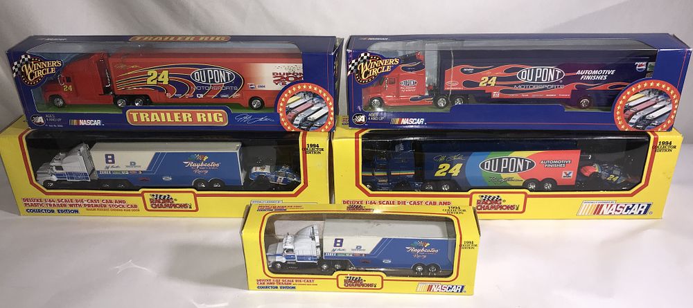 Lot 701: Jeff Gordon / Jeff Burton Transporters Collection