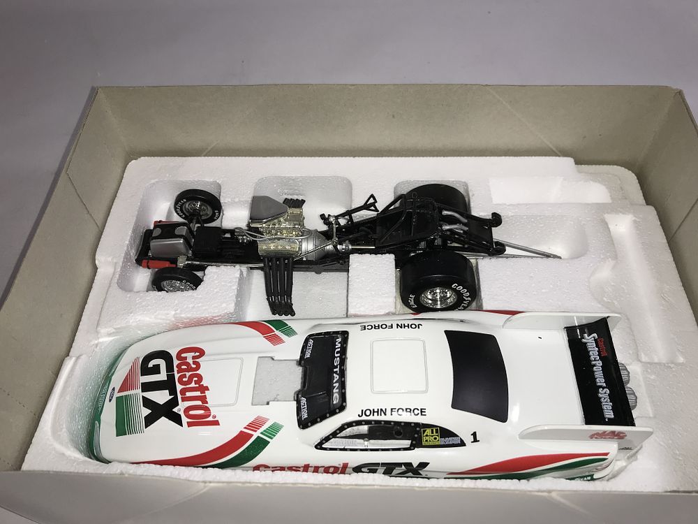 Lot 817: John Force 1997 Mustang Funny Car LE