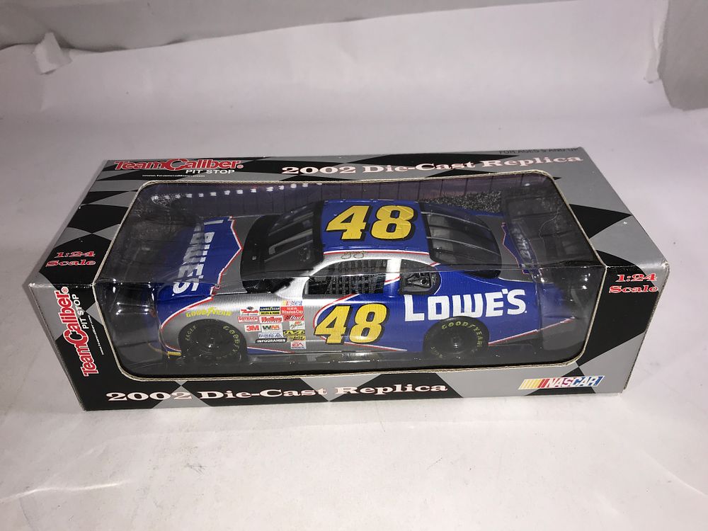 Lot 820: Jimmie Johnson Team Caliber 2002 Die-Cast
