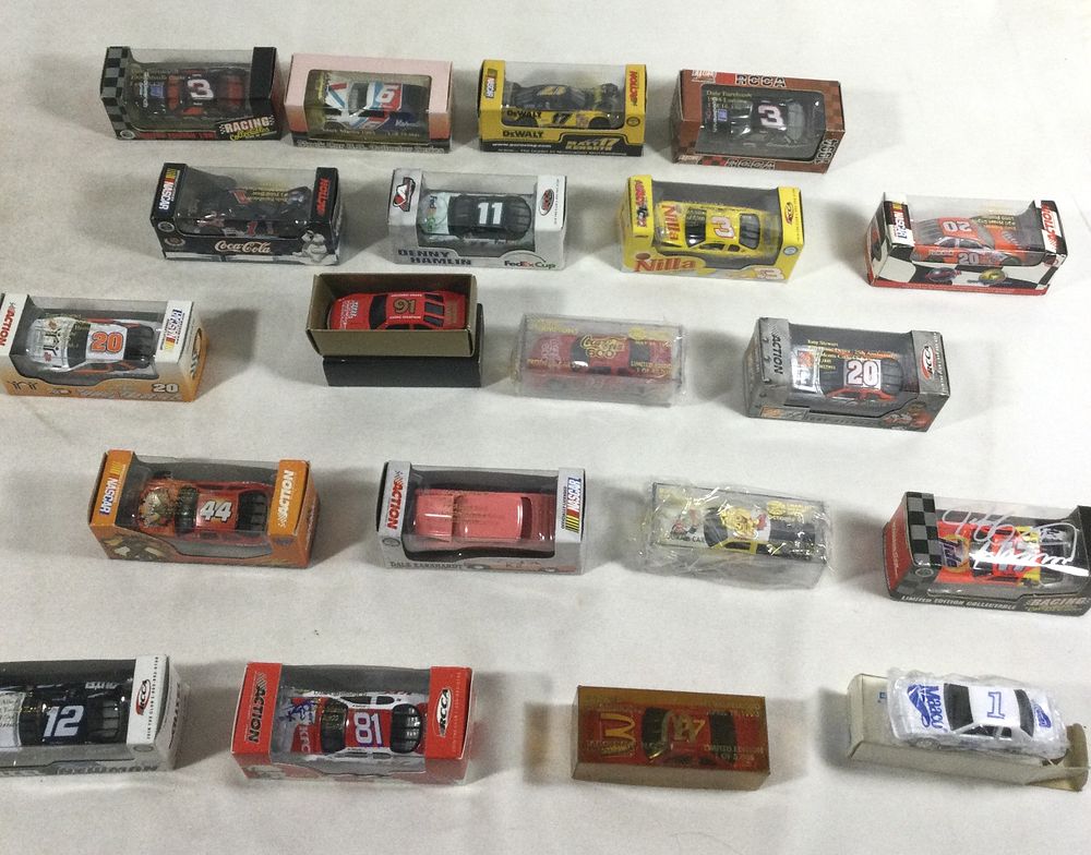 Lot 1349: 20 toy race cars all in sealed packages different