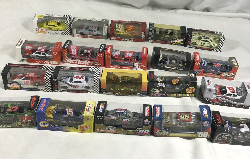 Lot 1354: 20 toy race cars in sealed packages