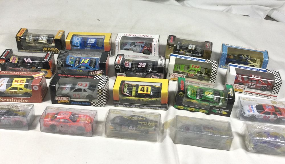 Lot 1357: 20 toy race cars all sealed packages