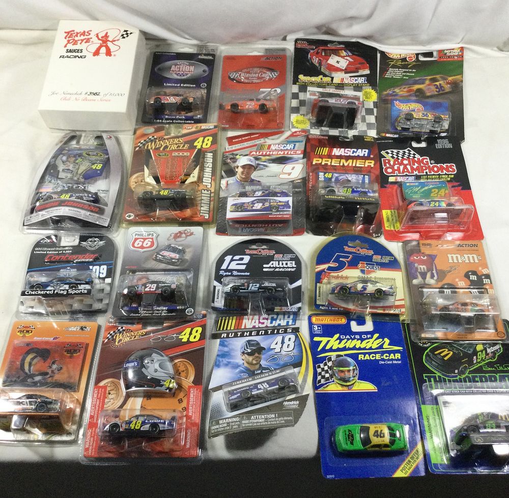 Lot 1360: 20 toy race cars all in original packaging