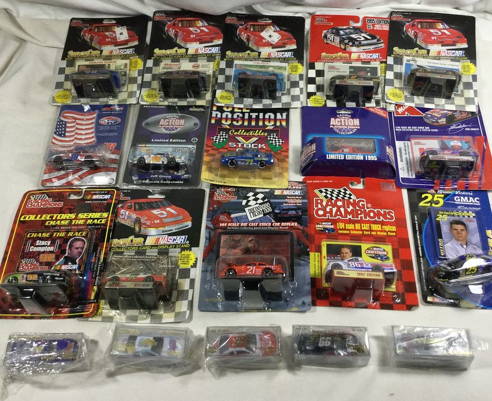 Lot 1364: 20 toy race cars all sealed in packaging
