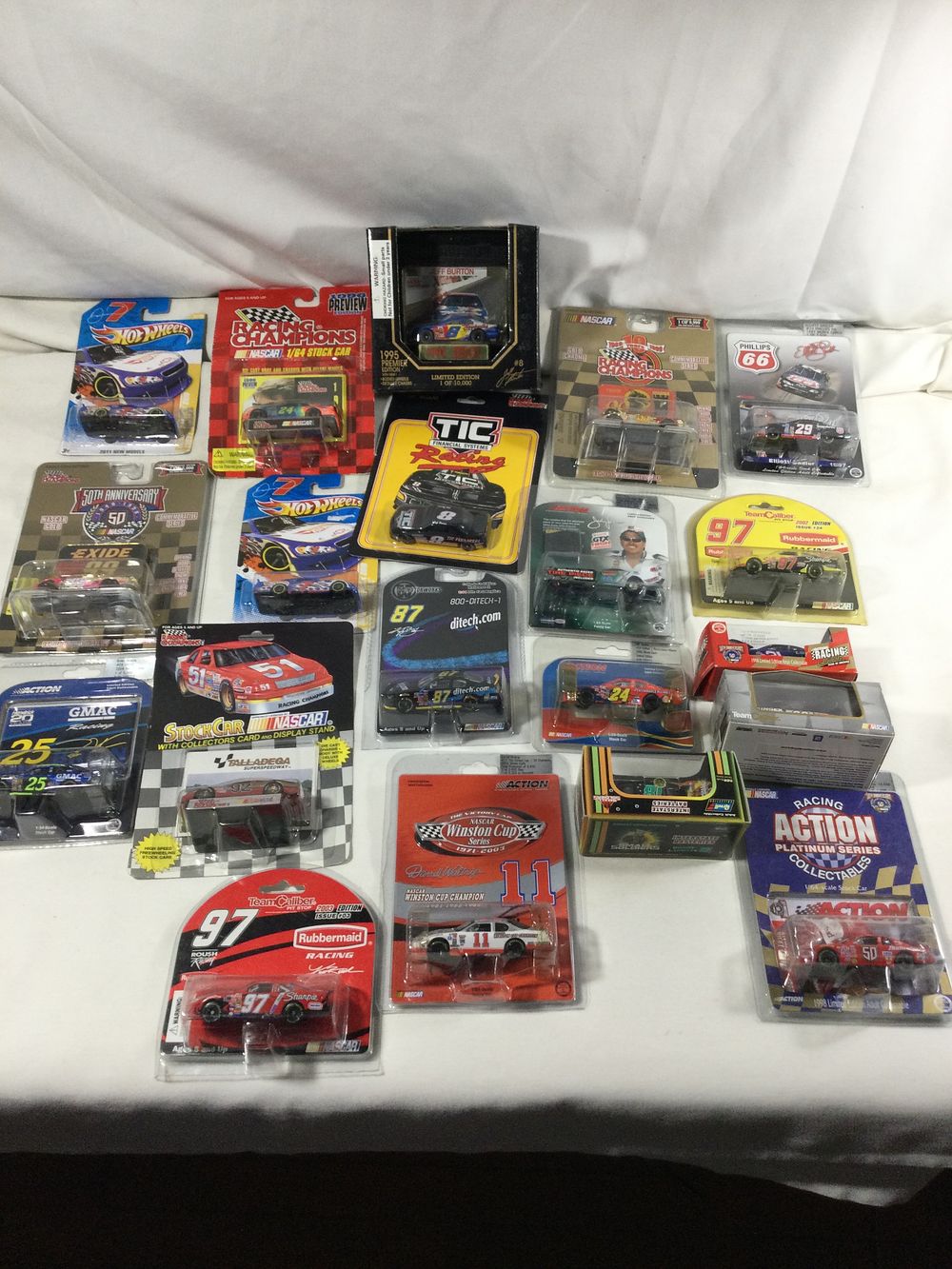 Lot 1369: 20 toy race car sealed packages 1:64 scale diecast