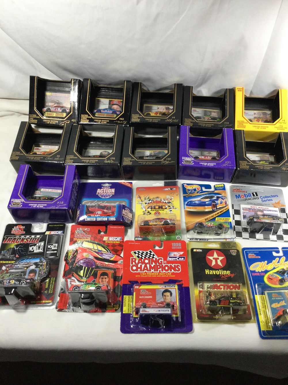 Lot 1373: 20 toy race cars ,all sealed in original packages