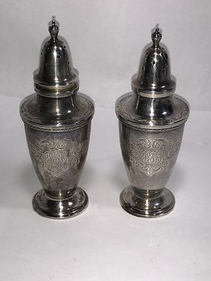 Sterling Salt & Pepper Shakers. S Kirk & Son co. 925/1000 stamped on bottom, each measures 5 