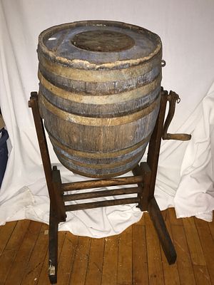 Wood Barrel Butter Churn on Stand. Comes in 2 pieces, cranks, measures approximately 30 inches 