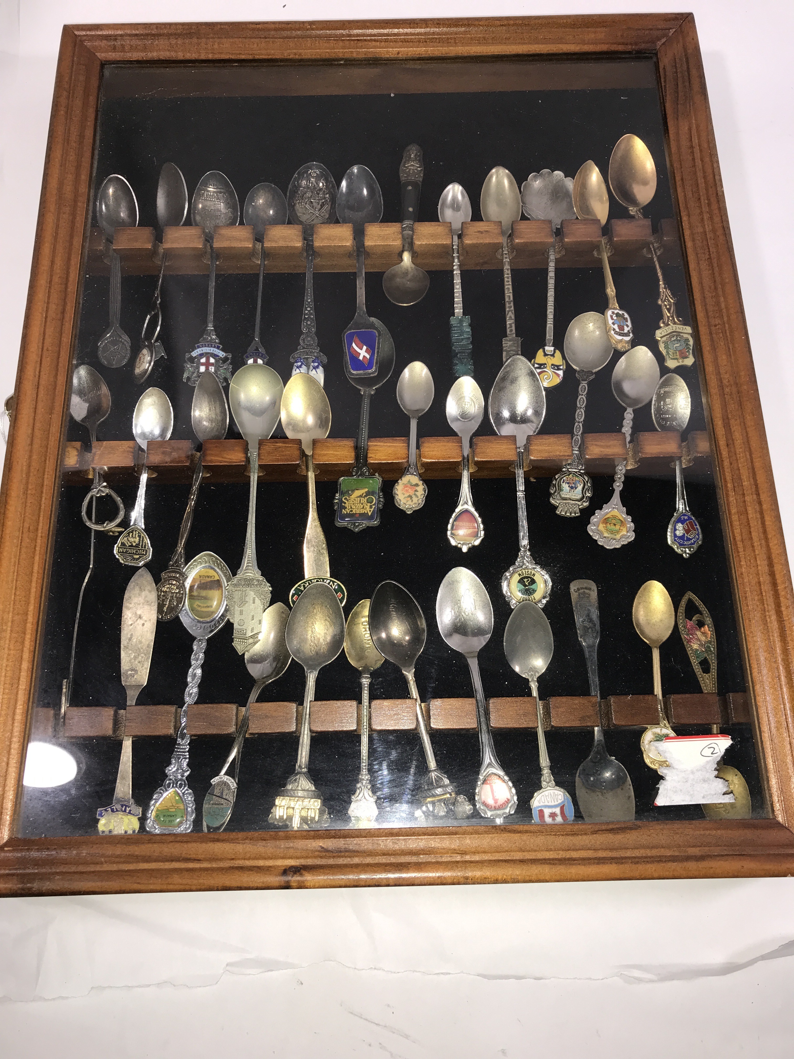 Vintage souvenir, spoon collection in wood display