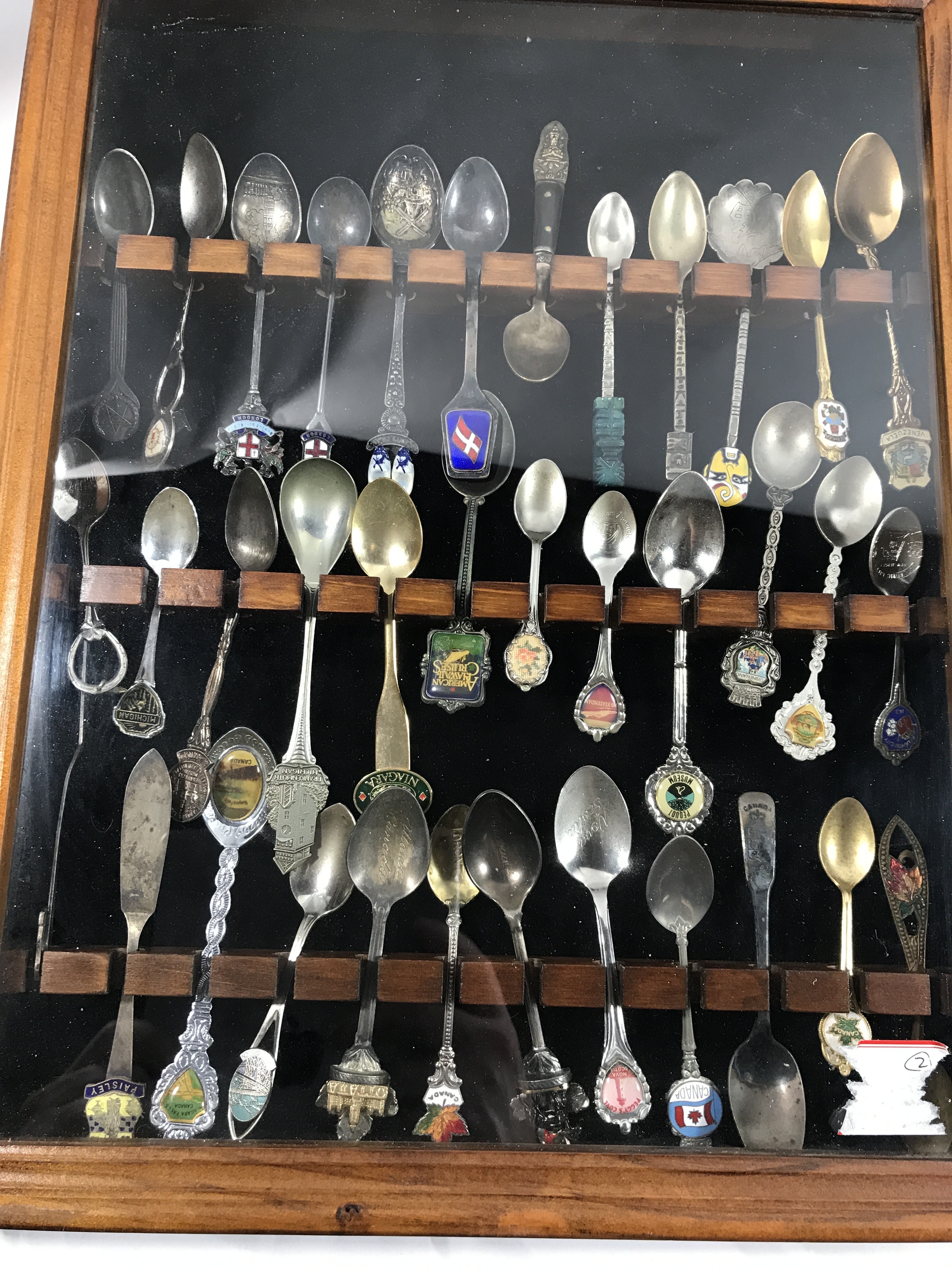 Vintage souvenir, spoon collection in wood display