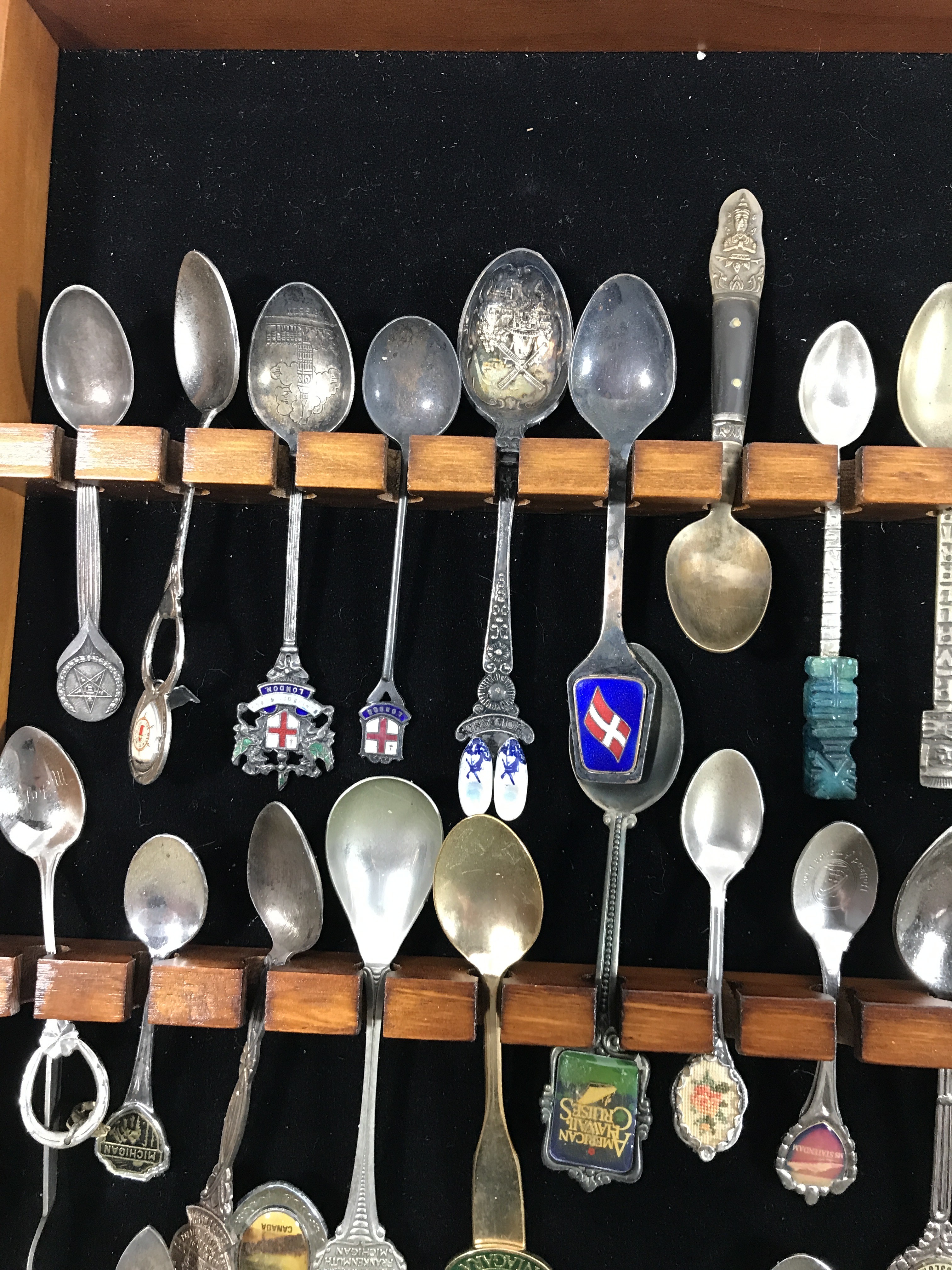 Vintage souvenir, spoon collection in wood display