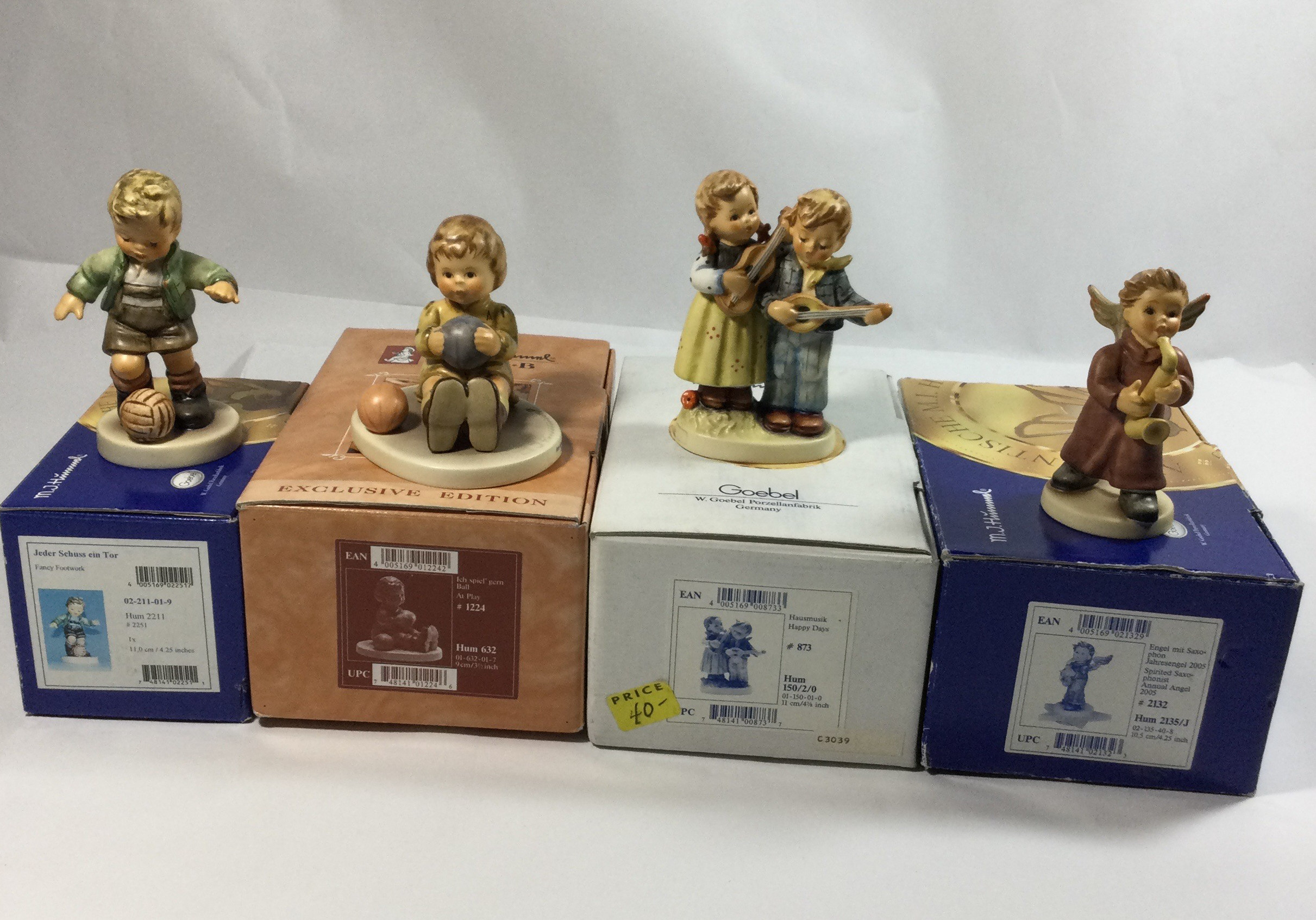 4 Collectible Hummel figurines