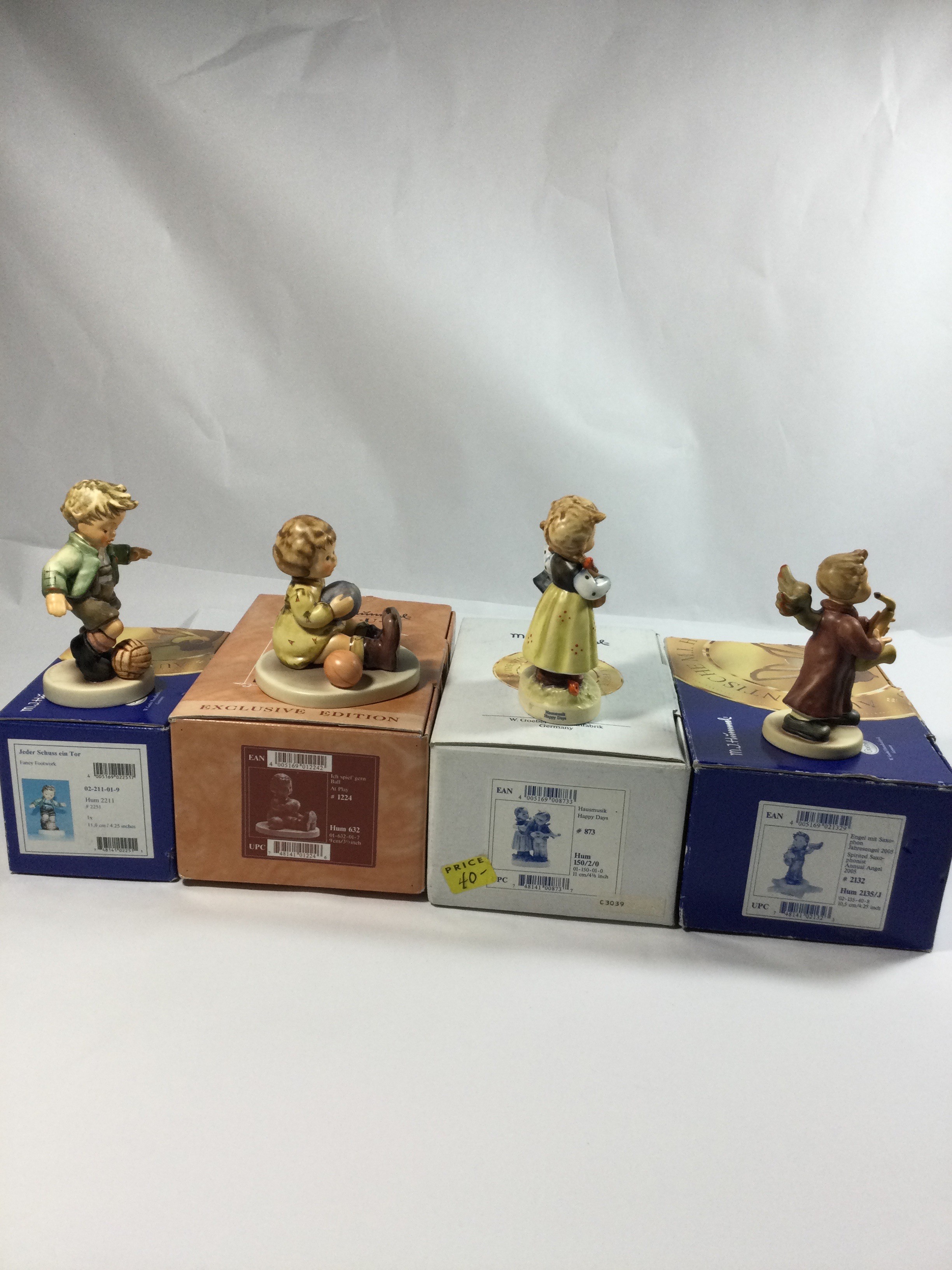 4 Collectible Hummel figurines