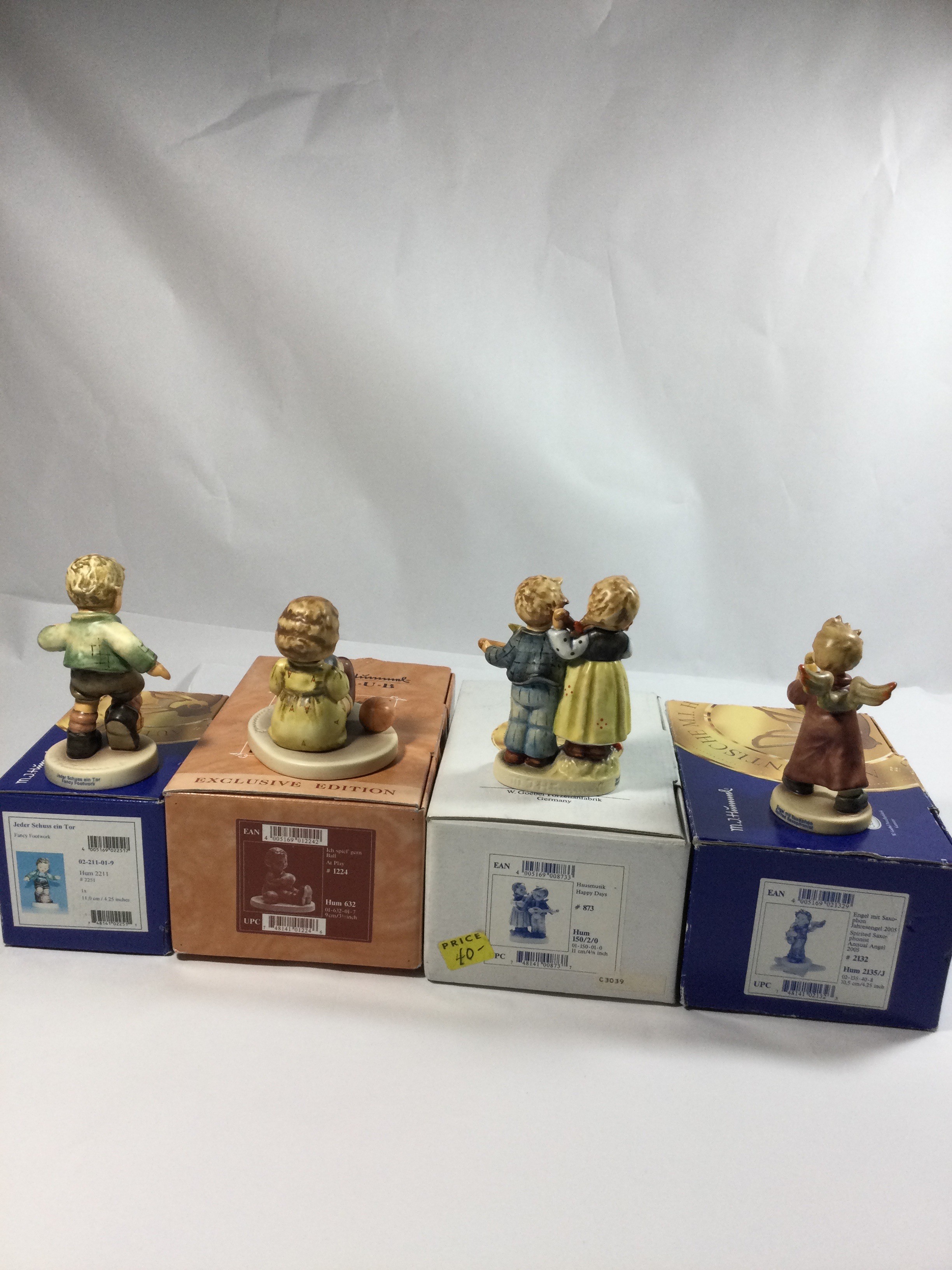 4 Collectible Hummel figurines