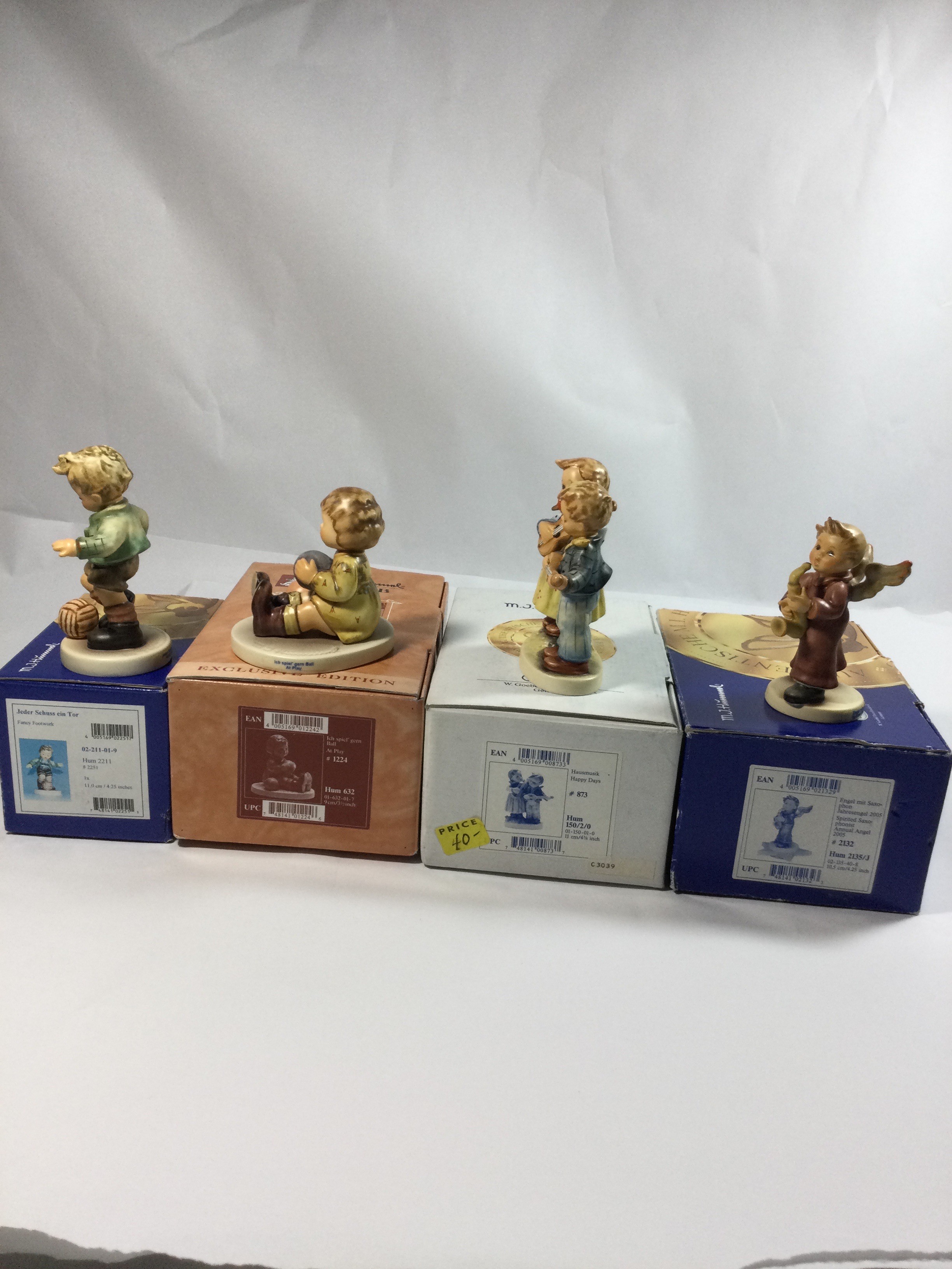 4 Collectible Hummel figurines