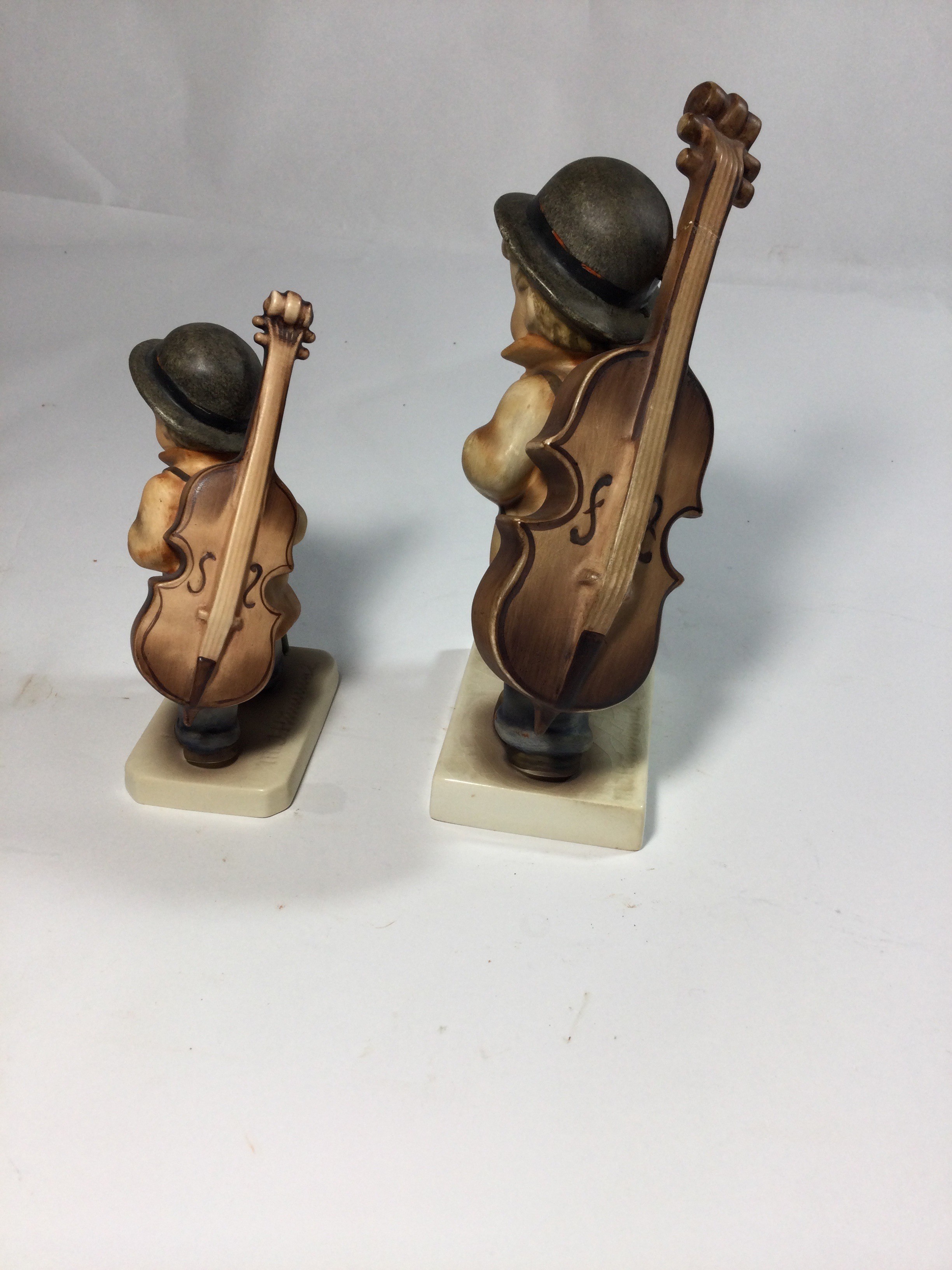 2 Hummel collectible figurines Little Cellist