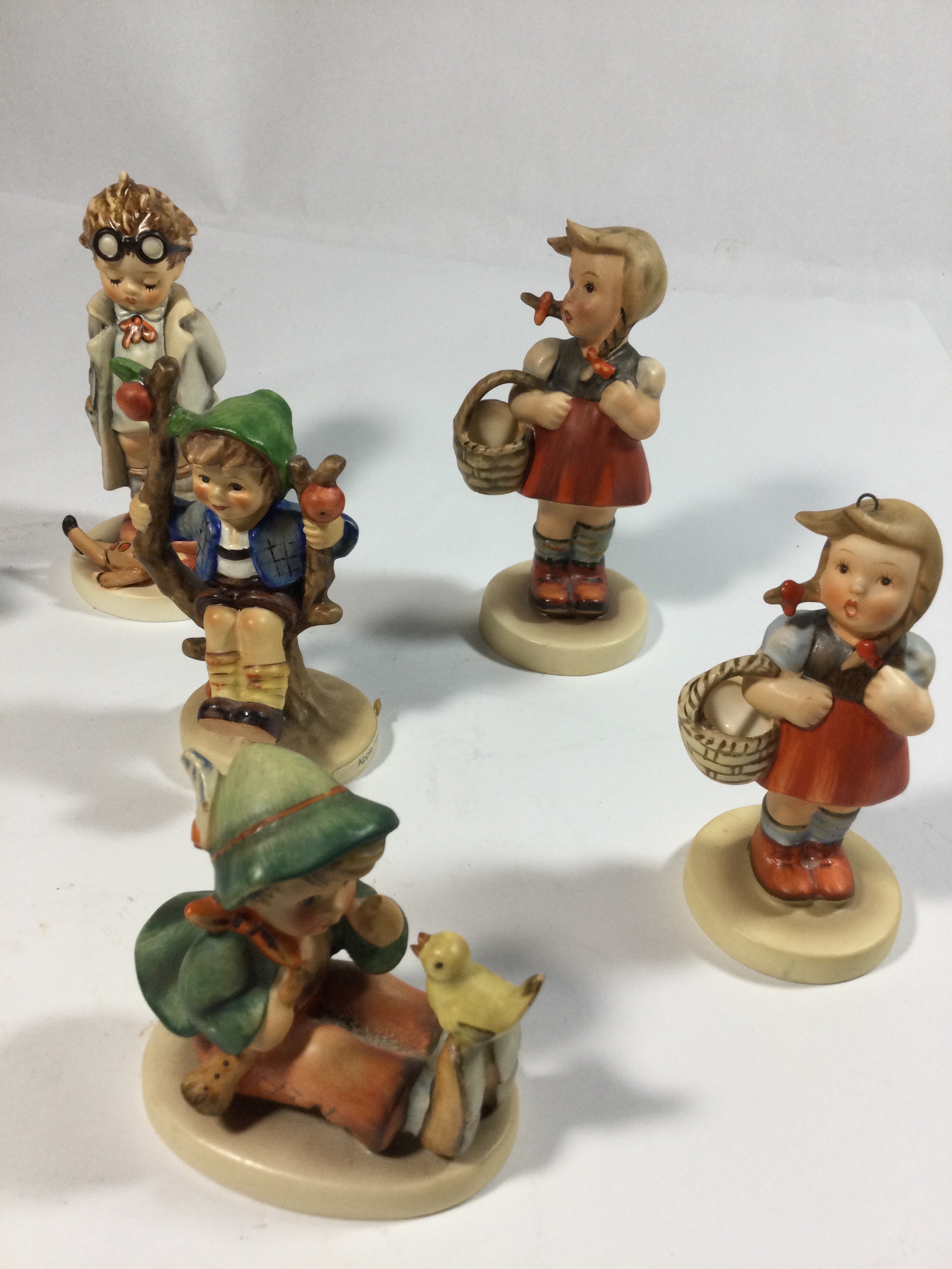 10 collectible Hummel figurines