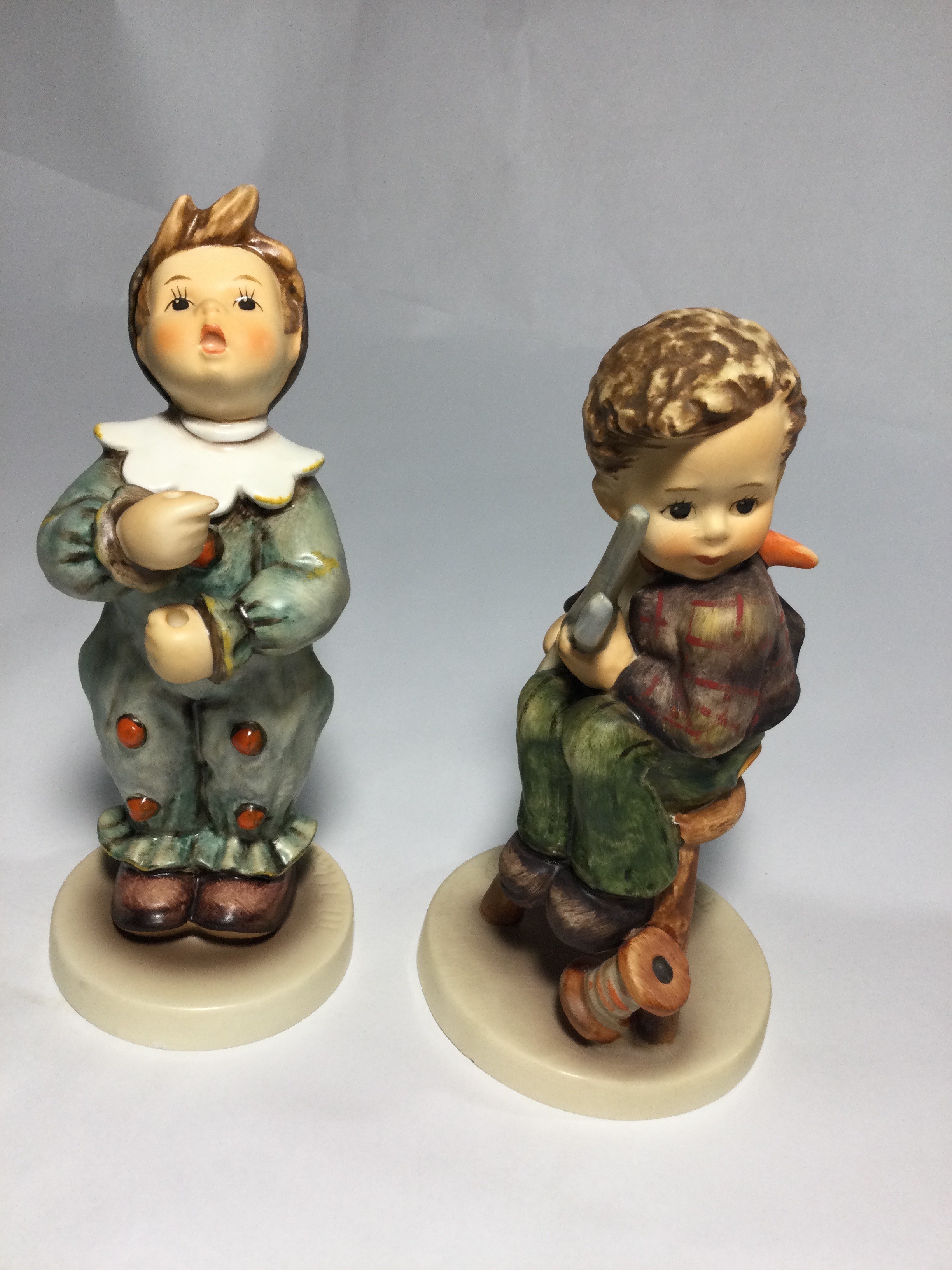 Five collectible Hummels figurines ,they are