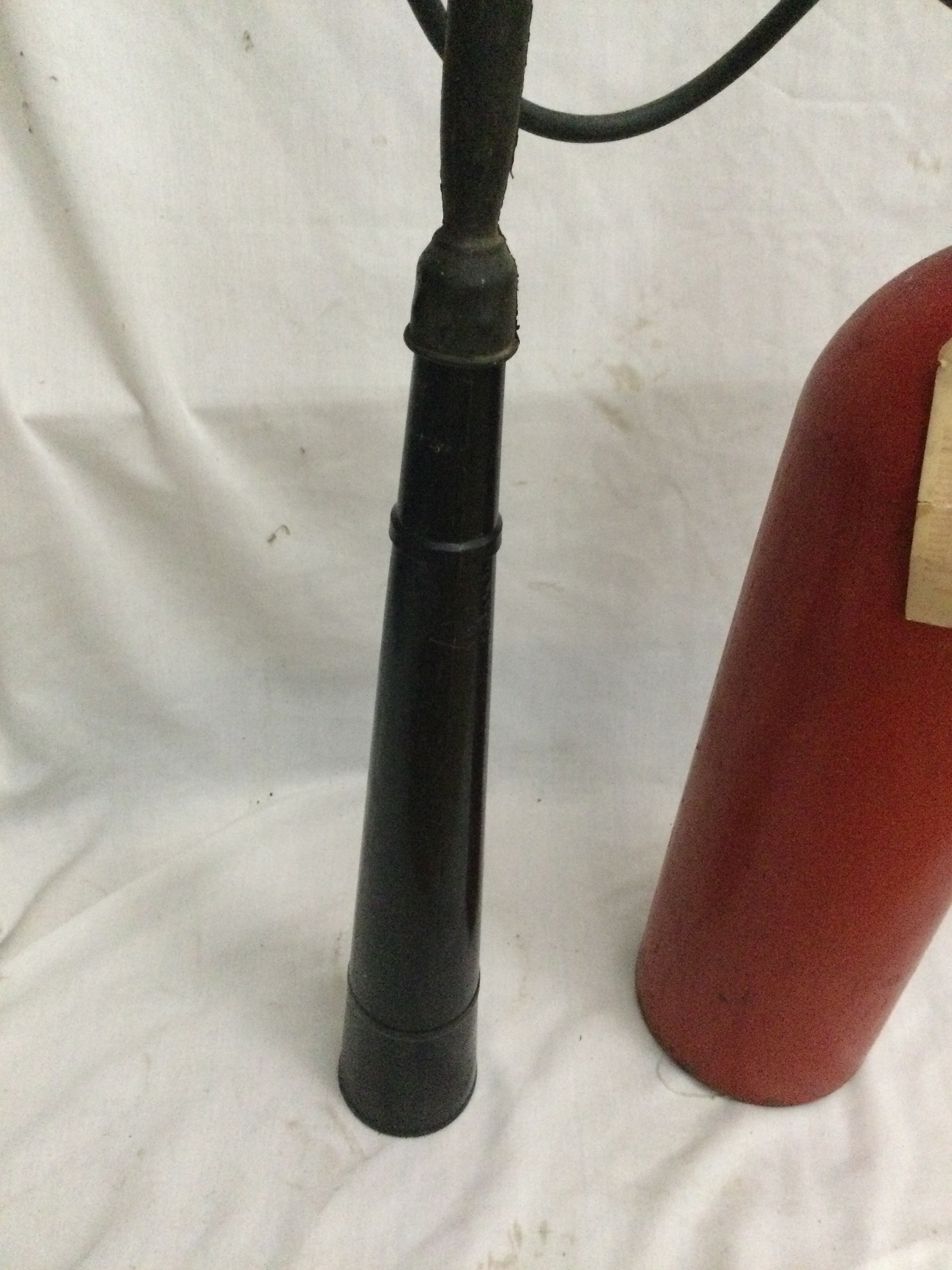 Vintage red carbon dioxide fire extinguisher from