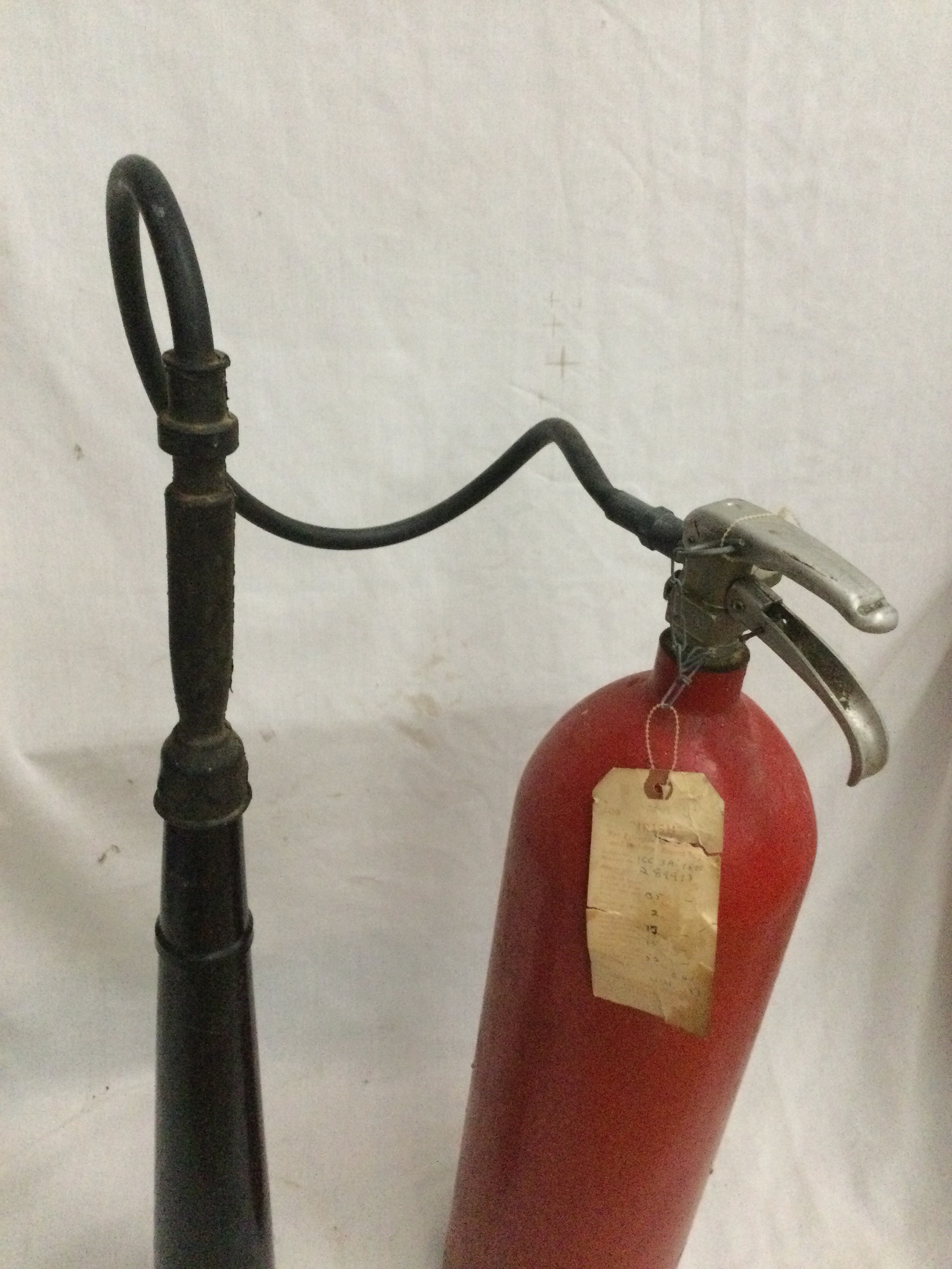 Vintage red carbon dioxide fire extinguisher from