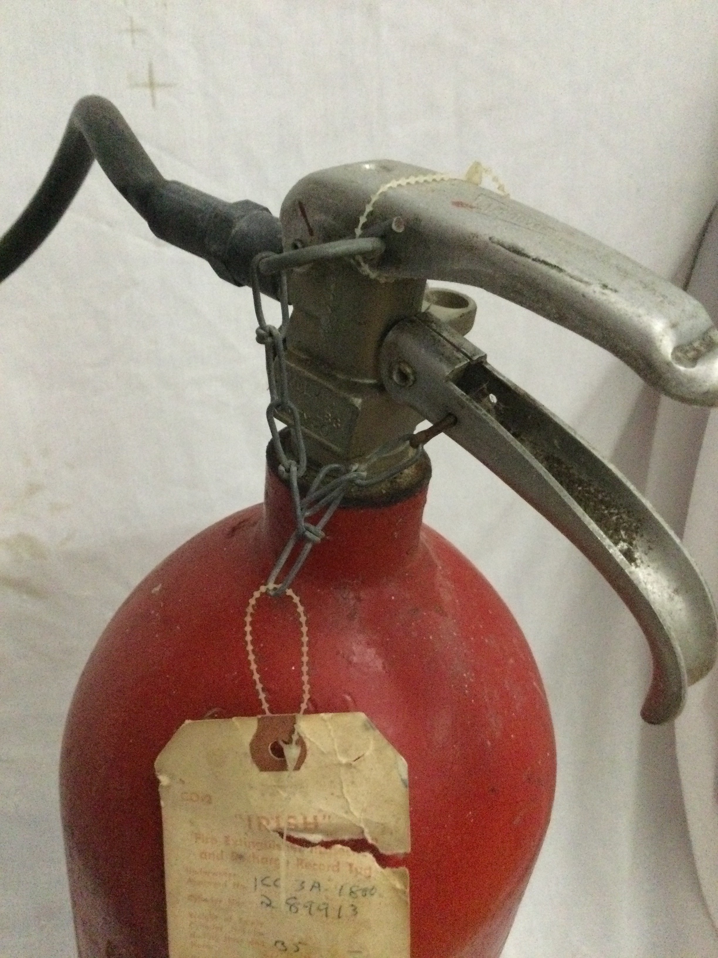 Vintage red carbon dioxide fire extinguisher from