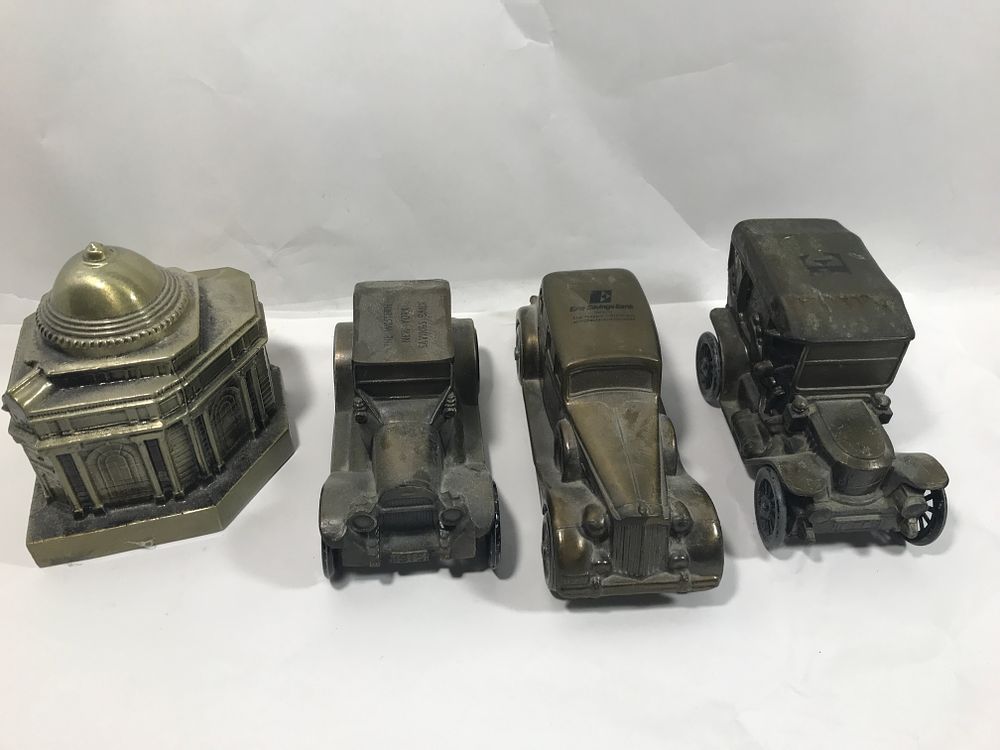 Lot 282: Cast Iron Bank Collection (4 total)