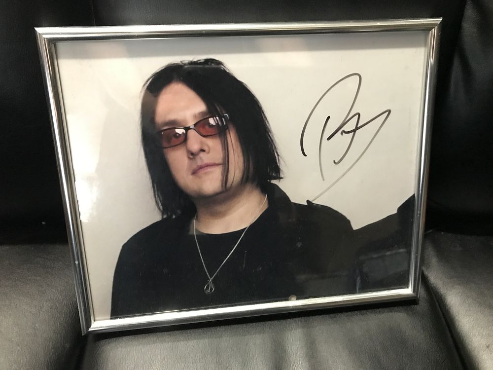 Lot 524: Goo Goo Dolls Robby Takac Autographed Color Photog