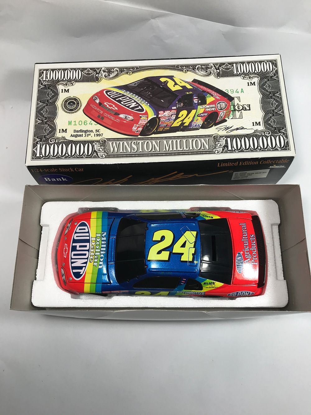 Lot 1014: Jeff Gordon #24 DuPont Million Dollar Date LE