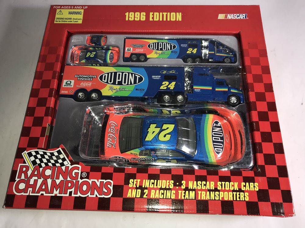 Lot 1045: Jeff Gordon 3 Stock cars & 2 Transporter set
