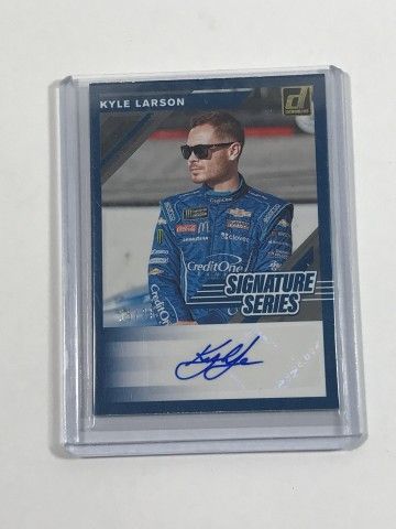 Lot 64: Kyle Larson Donruss 15 / 25 Signed Card