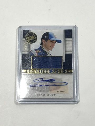 Lot 82: 2014 Press Pass Chase Elliot Autographed Relic Card In plastic protector numbered 24/25