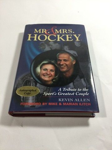 Lot 81: Autographed Gordie Howe Book