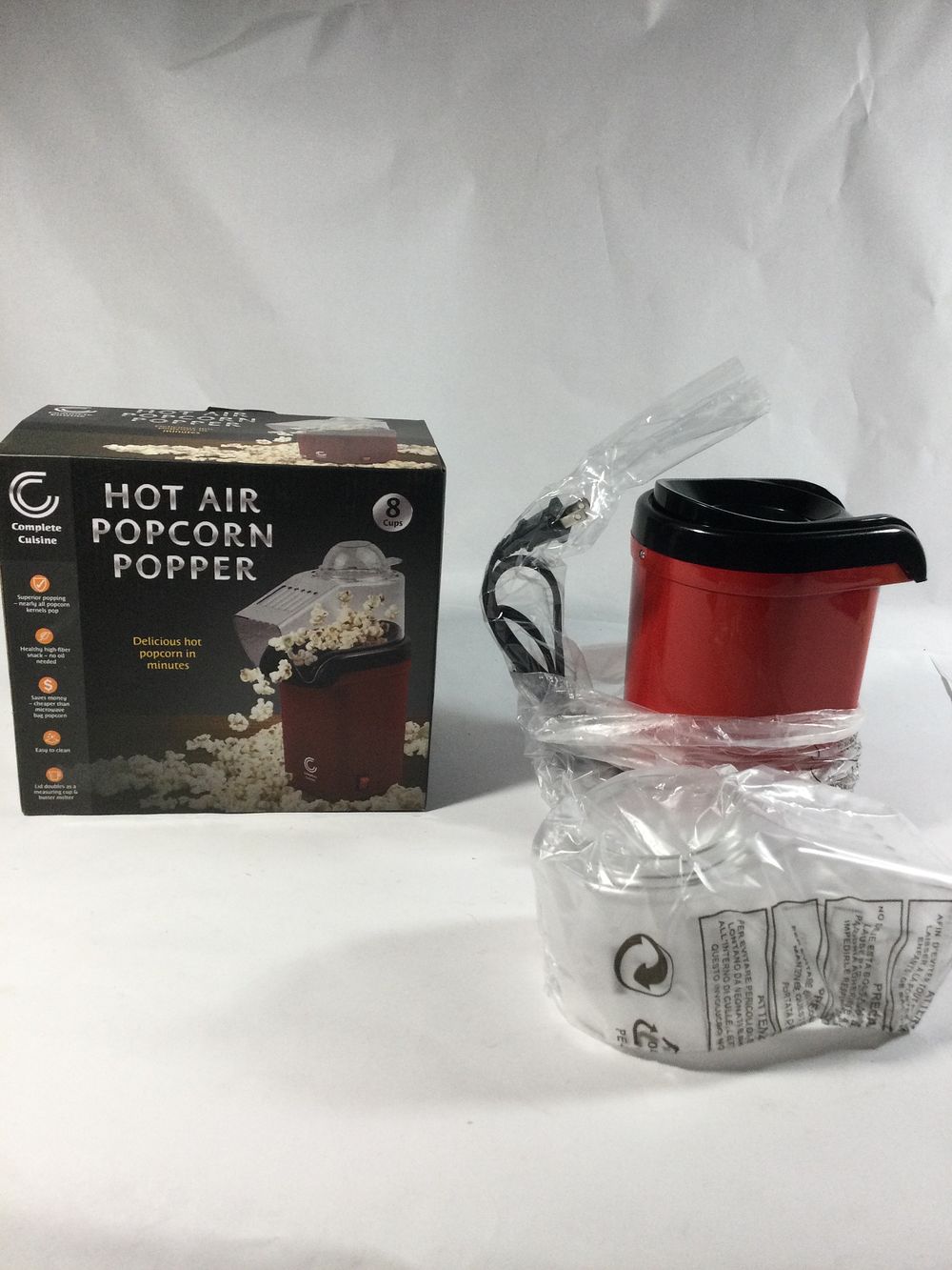 Lot 220: Hot air popcorn popper by complete cuisine ,box