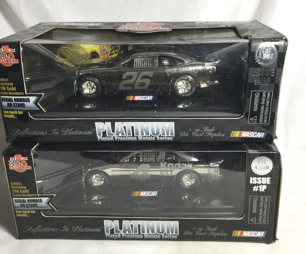 Lot 521: Platinum Plated Precious Metals Diecast Cars