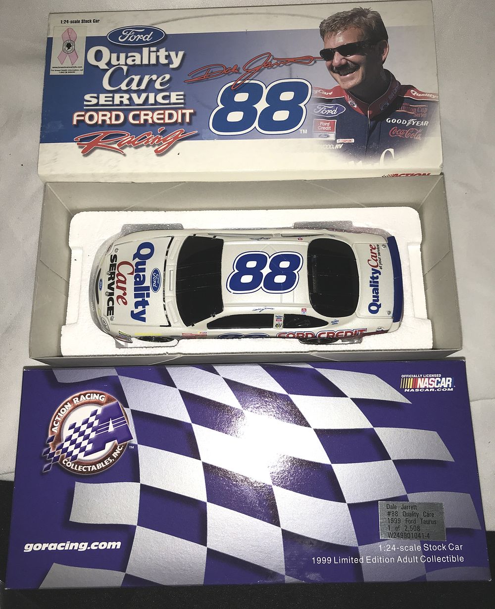 Lot 571: Dale Jarrett #88 Quality Care 1999 Ford Taurus