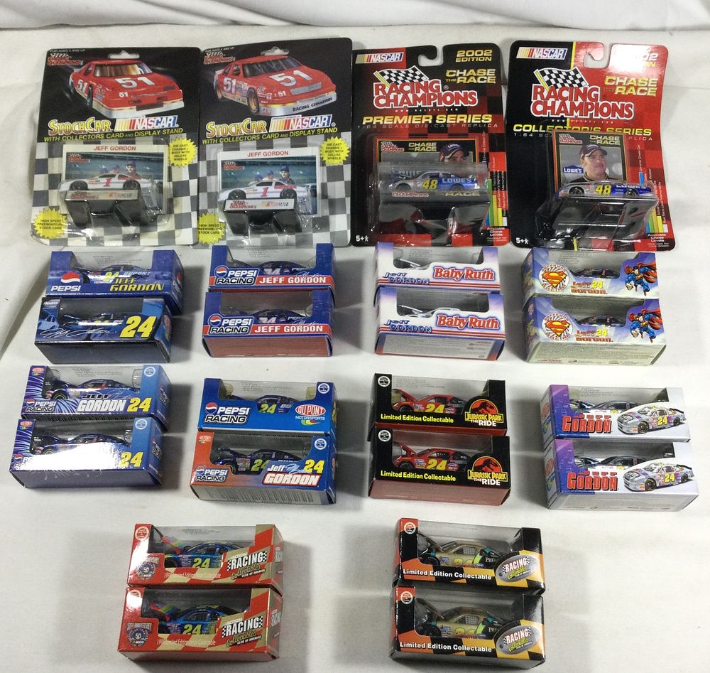 Lot 628: 24 Race Cars All in Sealed Packages 1:64 Scale