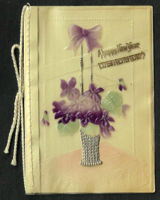 אגרת שנה טובה עשויה בקליט, כיתוב: "לשנה טובה תכתבו", כתובה באנגלית , תוצרת גרמניה