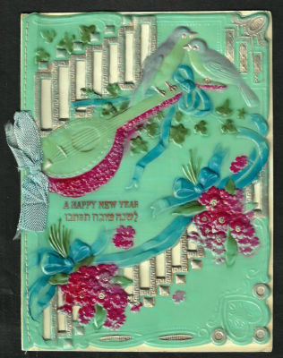 אגרת שנה טובה עשויה בקליט, כיתוב: "לשנה טובה תכתבו", כתובה באנגלית וביידיש, תוצרת גרמניה. מידות: 