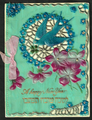 אגרת שנה טובה עשויה בקליט, כיתוב: "לשנה טובה תכתבו", כתובה באנגלית וביידיש, תוצרת גרמניה. מידות: 