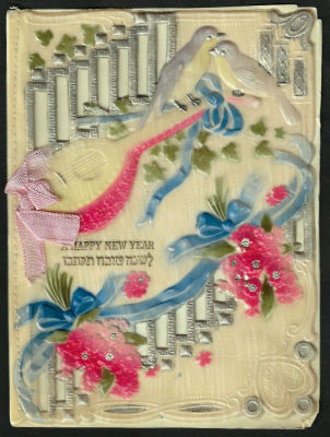 אגרת שנה טובה עשויה בקליט, כיתוב: "לשנה טובה תכתבו", כתובה באנגלית וביידיש, תוצרת גרמניה. מידות: 