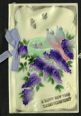 אגרת שנה טובה עשויה בקליט, כיתוב: "לשנה טובה תכתבו", כתובה באנגלית, תוצרת גרמניה