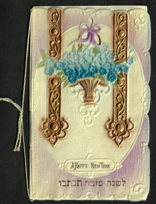 אגרת שנה טובה עשויה בקליט, כיתוב: "לשנה טובה תכתבו", כתובה באנגלית, תוצרת גרמניה. הפרדה חלקית 