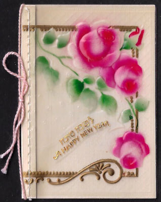 אגרת שנה טובה עשויה בקליט, כיתוב: "לשנה טובה", כתובה באנגלית, תוצרת גרמניה