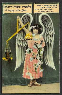 גלויה שנה טובה, תמונה יליד וכף מאזניים נושאת איש. כיתוב בעברית ויידיש